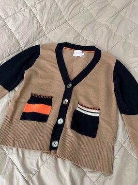 Brodie Cashmere Camel Knit Sweater with Black Neckline and Orange Piping